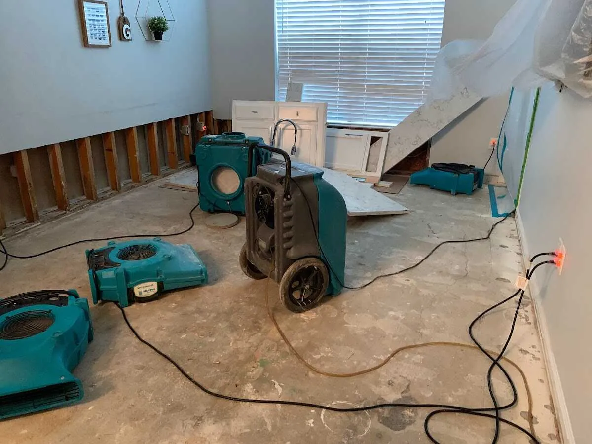 Dehumidifier in flood-cut room for Water Damage Restoration in Meridian